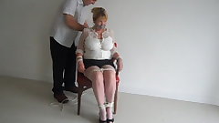 chair tied mature blonde