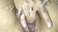 Massive squirting when fingering herself